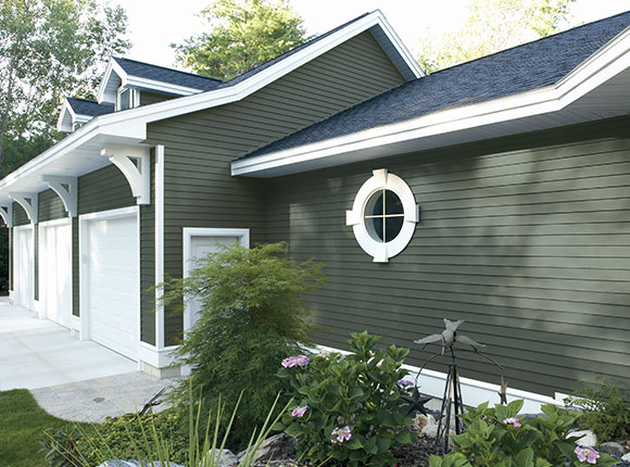 House with green Mastic Aluminum siding